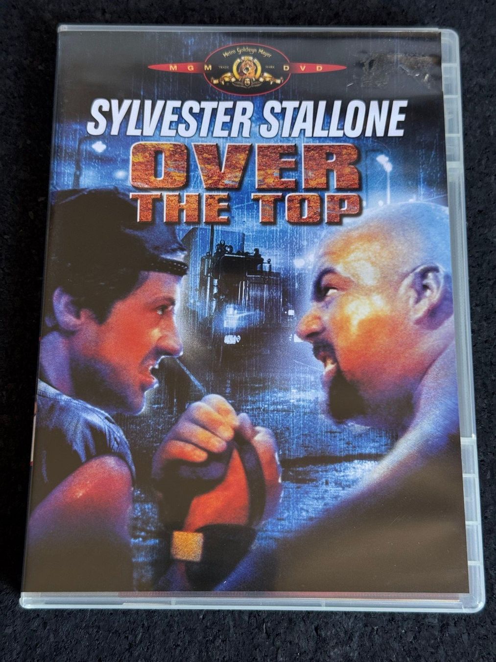 Tutti i DVDs: OVER THE TOP Silvester Stallone DVD DE/EN/TR/SP – Usato da Fribourg venduto da tschjoly