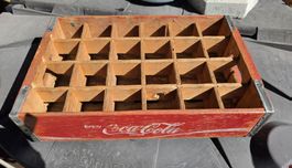 Alte Holzharasse für Cola-Flaschen