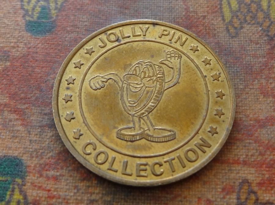 Tutti le monete: Jeton  " JOLLY  PIN  COLLECTION "  (M) – Usato da Romanel-sur-Lausanne venduto da Swift13
