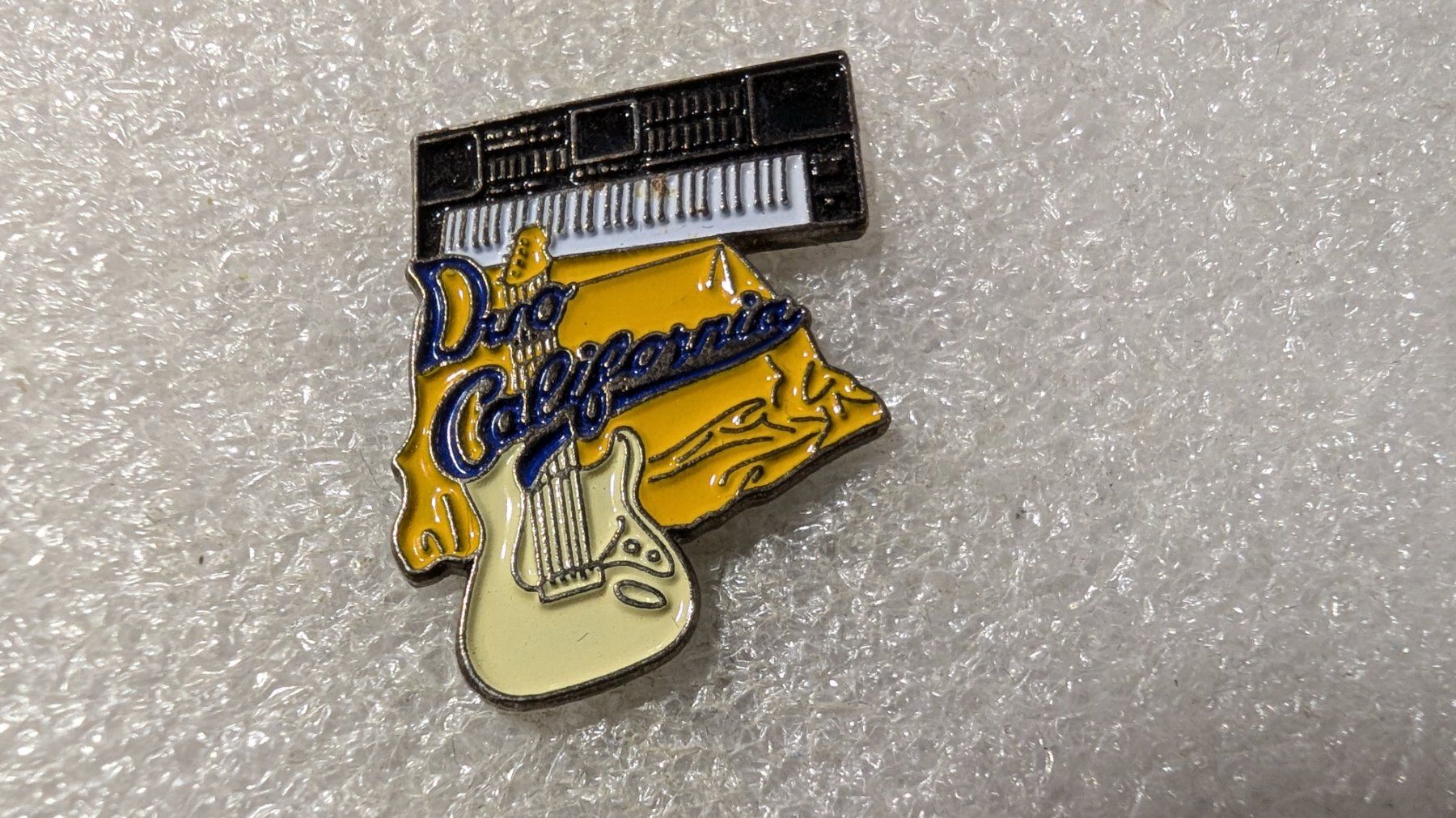 Placchette & Badge: Ansteckpin 207: Duo California – Usato da Oppligen venduto da Pin-Fall-Shop