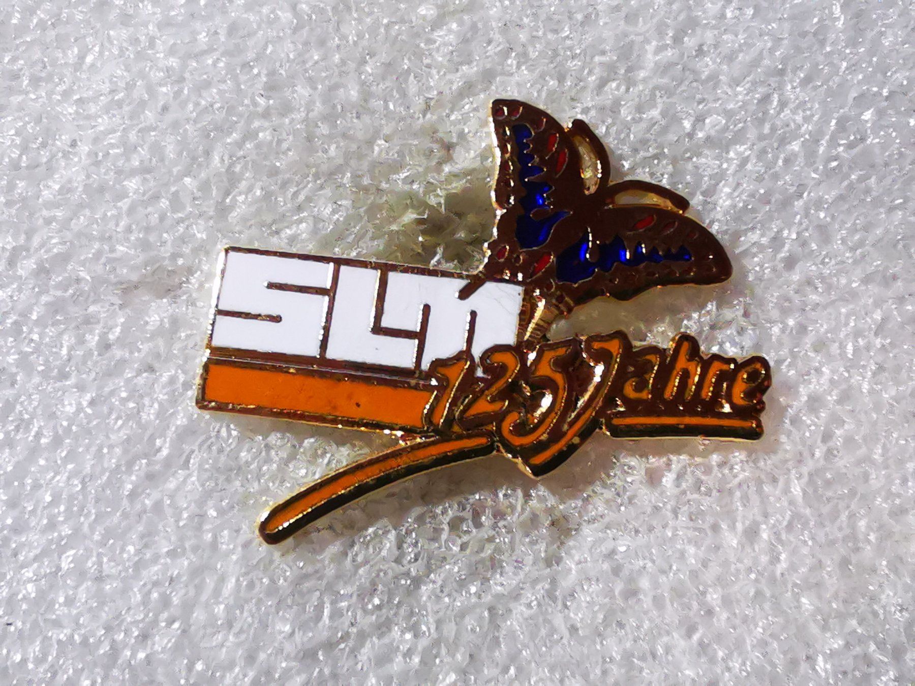 Placchette & Badge: Ansteckpin 119: SLM – Usato da Oppligen venduto da Pin-Fall-Shop