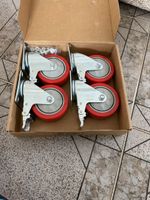 Lot de 4 roulettes pivotantes à frein rouges neuves