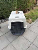 Caisse de transport pour chien grise bon état. Utilisé1x.