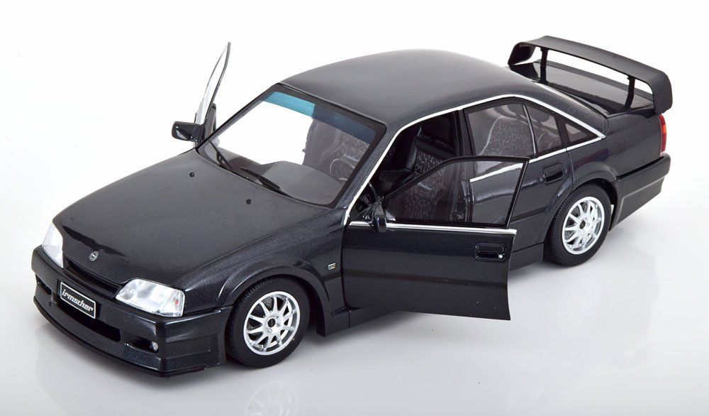 Opel Modellini d'auto: Opel Omega Evolution 500 1991-1992 dunkelgrau met.      1:18 – Nuovo e nell'imballaggio originale da Gerlafingen venduto da espero88 2