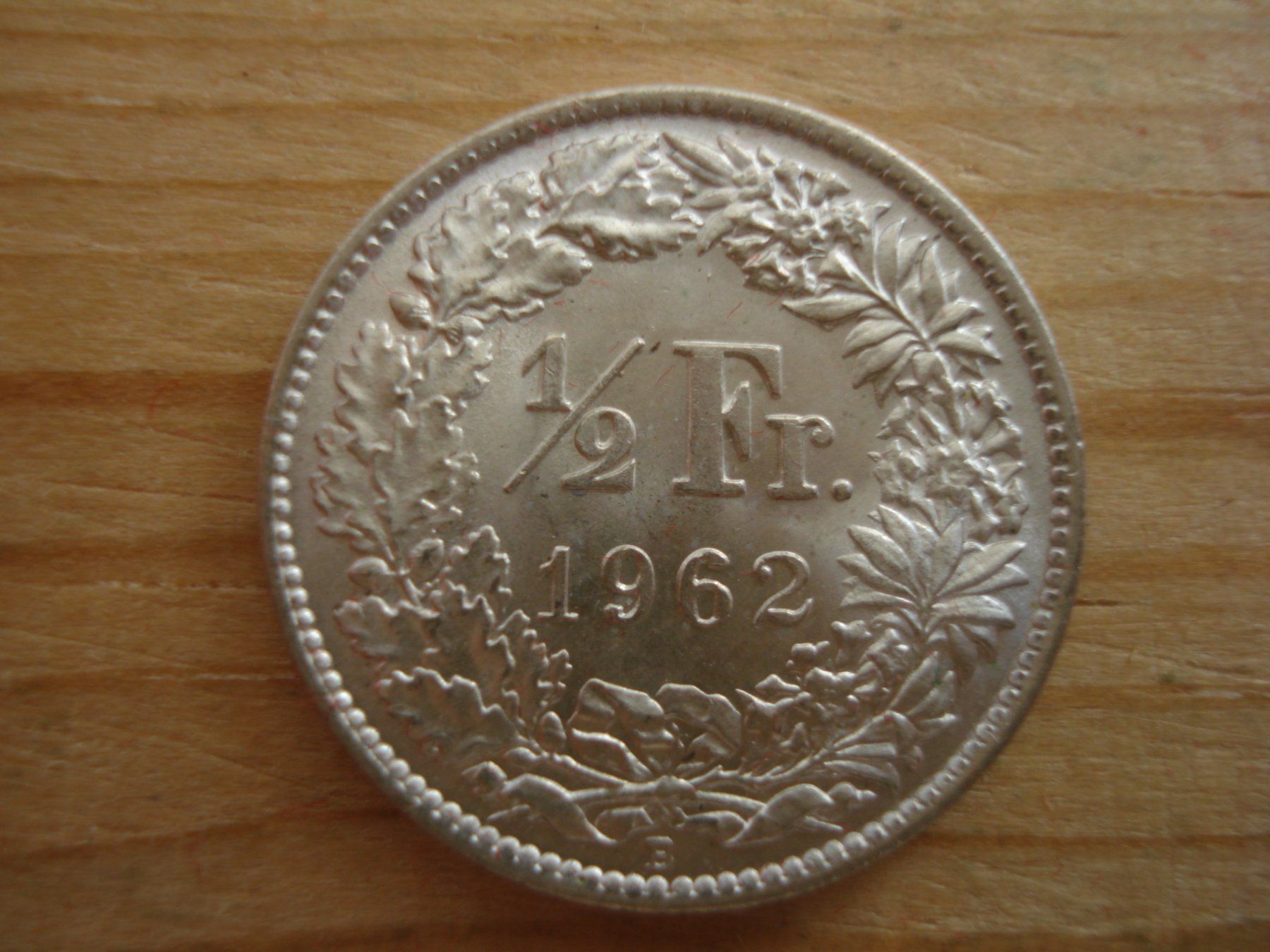Tutti le monete: (S1)      1/2 Franken 1962 STGL – Usato da Erlach venduto da Net-Coins