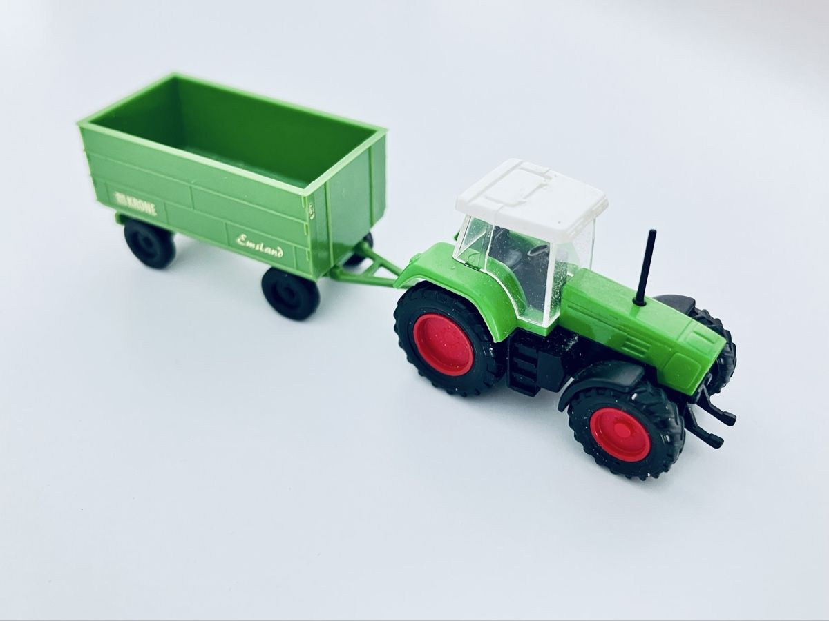 Swiss Modellini di ferrovie: Traktor mit Anhänger KRONE SPUR N – Nuovo e nell'imballaggio originale da Oberbuchsiten venduto da Orsetto24