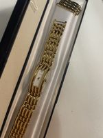 Montre Sandoz dorée SWISS made