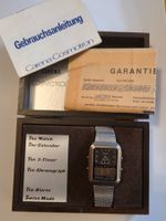 Vintage Carena Cosmotron Quartz Uhr mit Holzbox u. Papieren