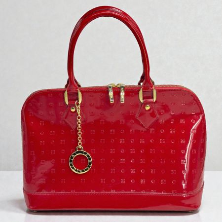 Sac à main ARCADIA en cuir verni rouge. Comme neuf
