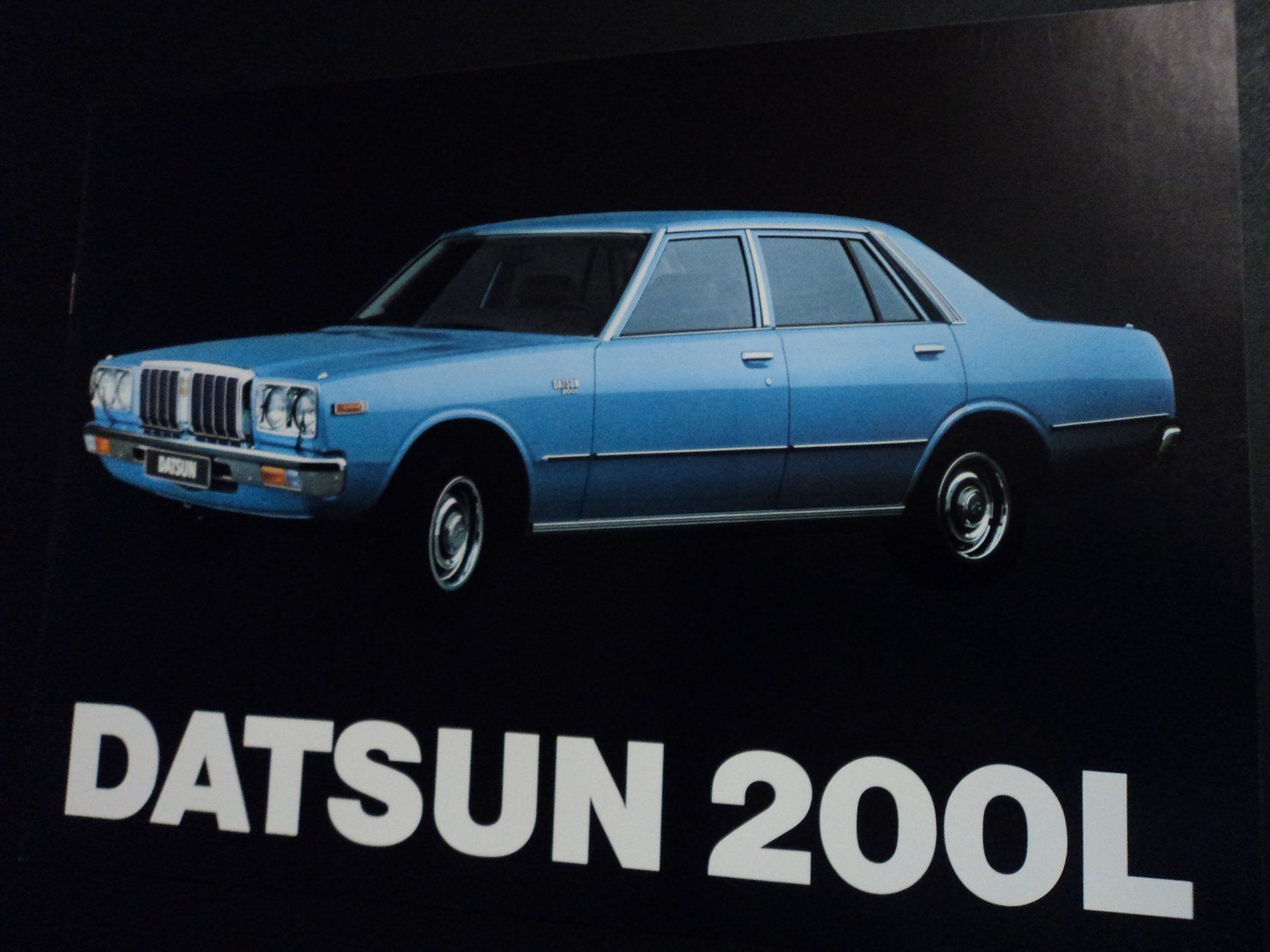 Datsun Dokumente: Prospekt Datsun 200L 1977 – Gebraucht aus Schwarzenburg von modelCARama