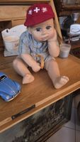 Sammlerpuppe Junge mit Schweizer Kappe ca. 30cm hoch 