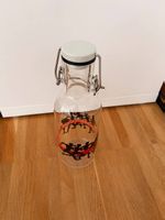 Glastrinkflasche mit Bügelverschluss  Sportmotiv