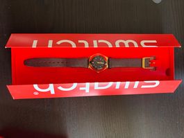Schöne Swatch Uhr mit Goldrand und braunem Armband, top Z...