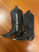 Off-white leather cowboy boots