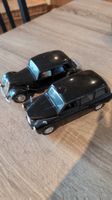 Zwei schwarze Modellautos, Sammlerstück