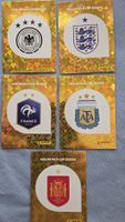 Panini WM 2026 5er ESP1, Arg1, ENG1, FRA1, GER1 Wappen