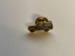 Pin's Nissan Patrol véhicule tout-terrain doré