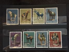 Timbre Chine antique 8 timbres chevaux et chameaux