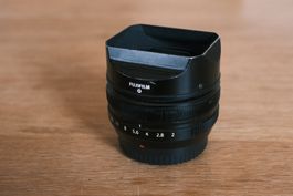 Fujifilm XF 18 f/2 Pancake mit original Sonnenblende