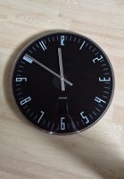 Wanduhr Karlsson, schwarz/silber, sehr guter Zustand