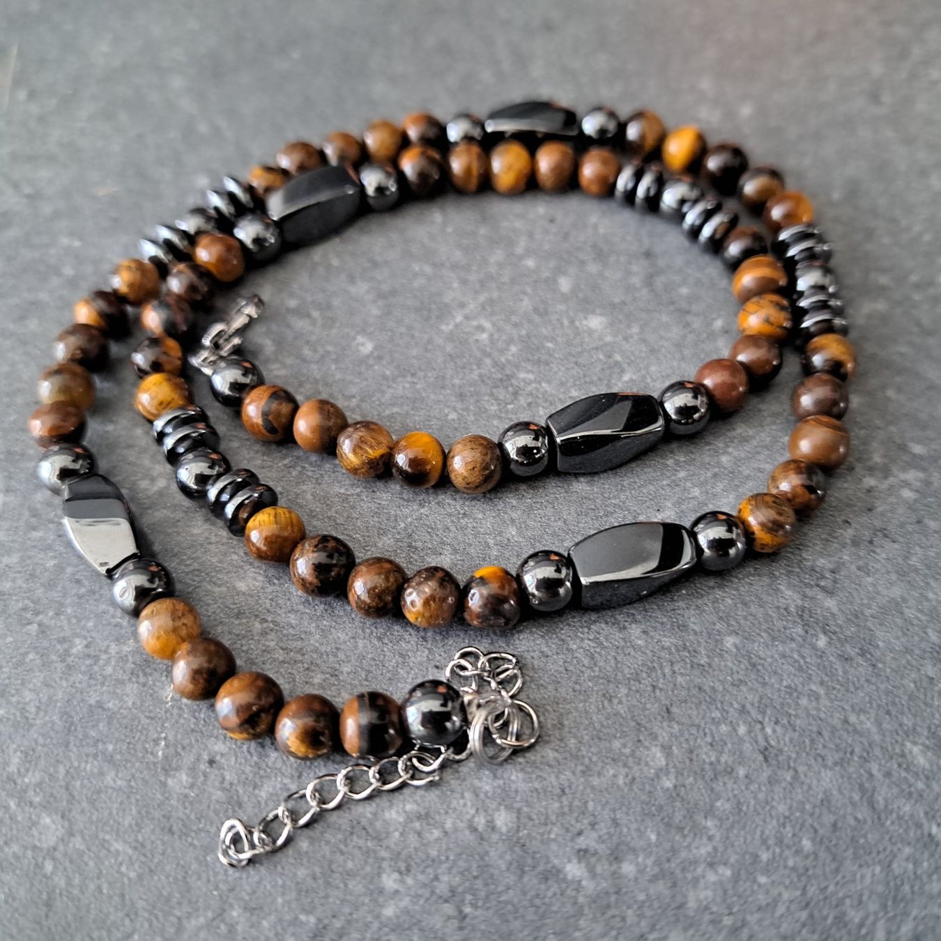 Ketten: Collier de perles Oeil de tigre – Neu und originalverpackt aus St-Imier von supernova21