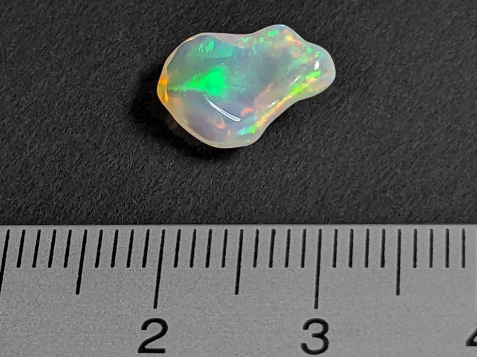 Minerali & Pietre curative: Opal - Äthiopischer Welo Opal 12mm, 1.55ct – Nuovo e nell'imballaggio originale da Meilen venduto da StoneGarden 1