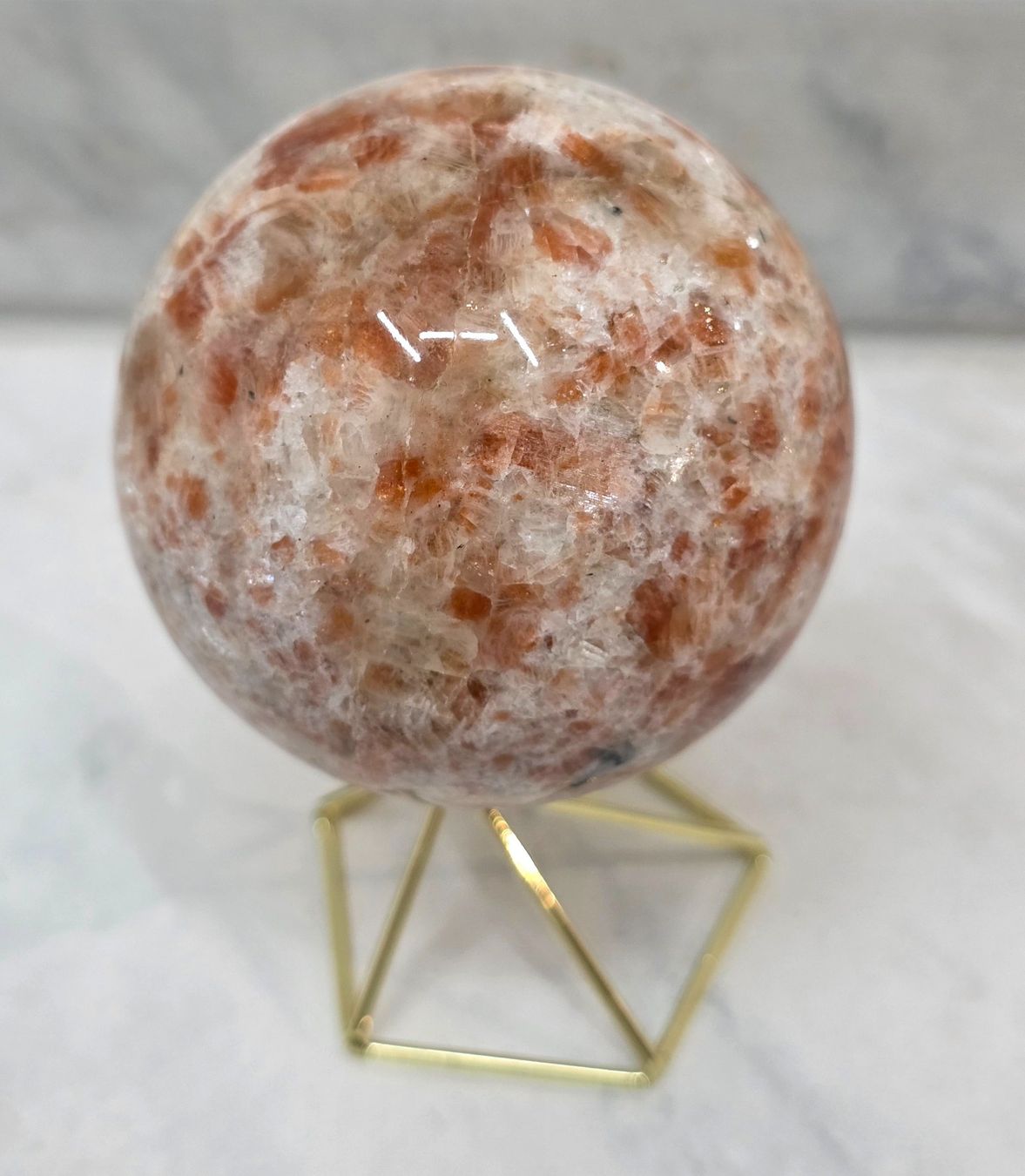 Minerali & Pietre curative: Arusha Sonnenstein Kugel 70mm 455g – Nuovo e nell'imballaggio originale da Matzingen venduto da Shay_Crystalz