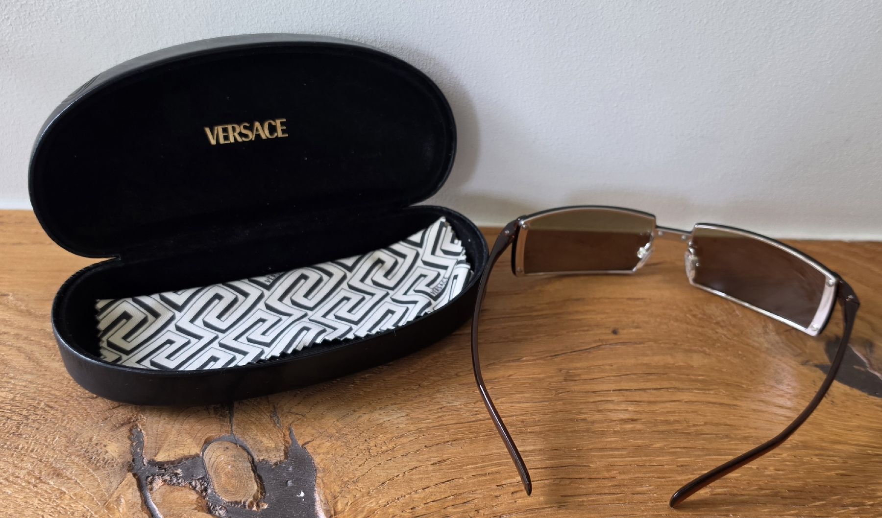 Versace Occhiali & Lenti: Versace Versus Sonnenbrille braun  – Usato da Eglisau venduto da naminaso 5