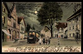 AK Reinach, Straßenpartie mit Strassenbahn im Mondschein