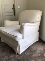 Grand fauteuil en tissu blanc