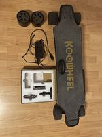 Elektro-Skateboard Koowheel mit Ladegerät und Zubehör