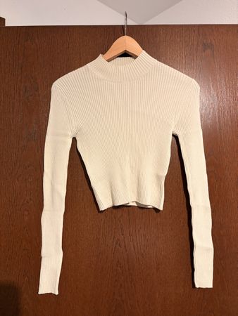Maglione crop a collo alto Sisley