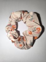 Chouchou en tissu motif floral beige et orange neuf