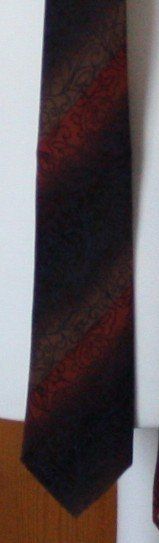 Cravatte: Krawatte Seide dunkelblau-ocker-orange – Usato da Flüelen venduto da Diversicum-Textil 1