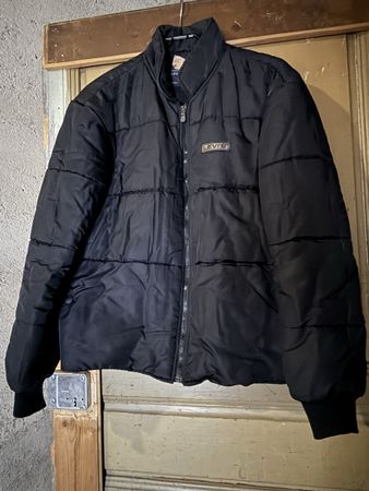 Doudoune Levi's noire, taille M.
