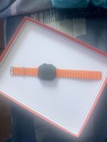 Montre connectée avec bracelet orange