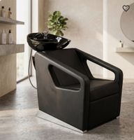 Schwarzer Friseurstuhl mit Becken