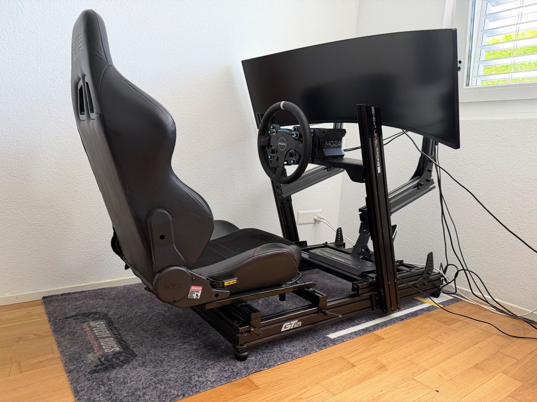 Console: Sim racing rig: Next Level Racing GT-Elite, Moza, 49" – Usato da Hendschiken venduto da emstan
