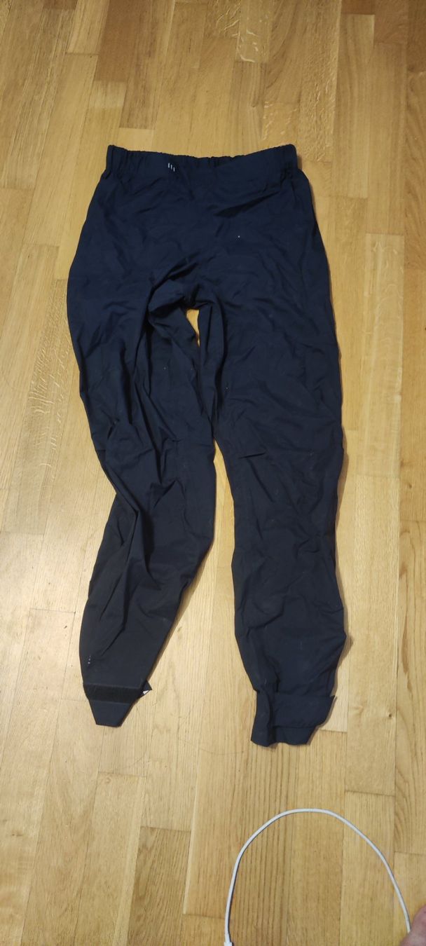 Oxylane decathlon Pantalon de pluie pour 2 roues Acheter sur Ricardo