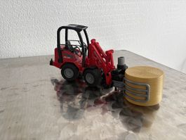 Bruder Schäffer Hoflader 2630 mit Ballengabel rot gebraucht