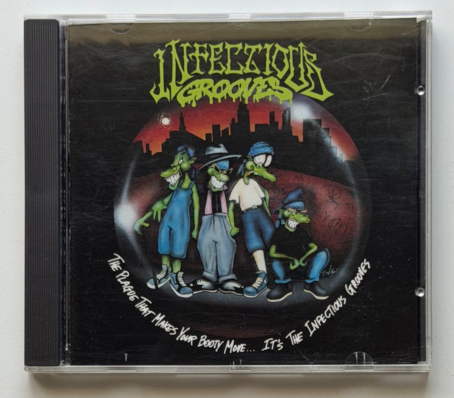 CD: Infectious Grooves / The Plague That Makes Your Booty Move.. – Usato da Näfels venduto da rottabi