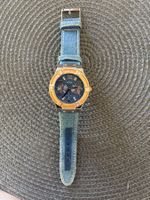 Montre Guess bracelet jeans cadran doré avec strass