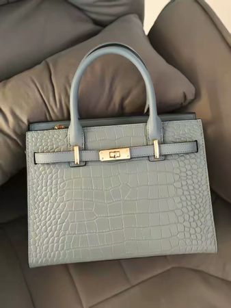 Elegante Echtleder-Handtasche  Diese hochwertige Handtasche 