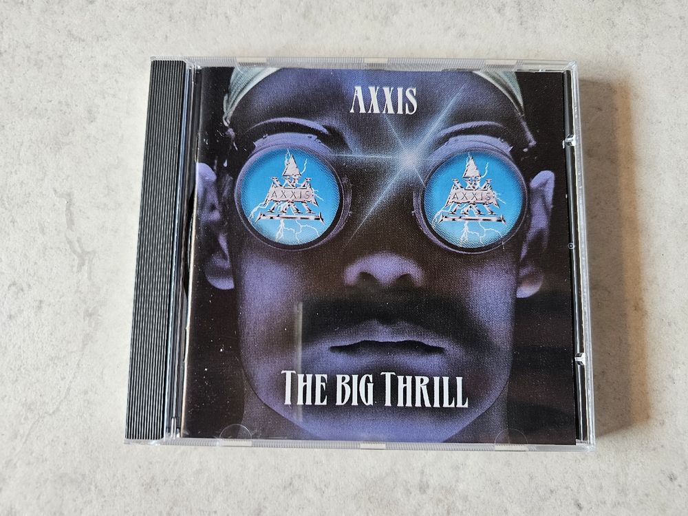Axxis - The Big Thrill (Gebraucht) in Schneisingen für CHF 6 – mit ...