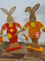 2 Holz-/ Drahtfiguren je H 22 cm