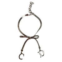 Vintage DIOR Armband/Bracelet mit Schleife und CD-Anhängern