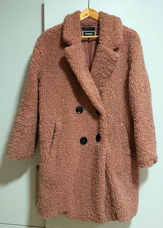 Manteau d'hiver rose vintage parfait état.