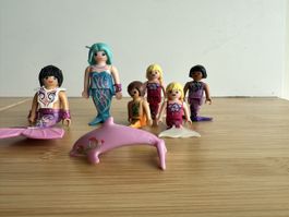 PLAYMOBIL Meerjungfrauen-Set mit 6 Figuren und rosa Delfin.