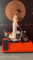 Motorrad-Karusell vor der Migros von ca. 1970