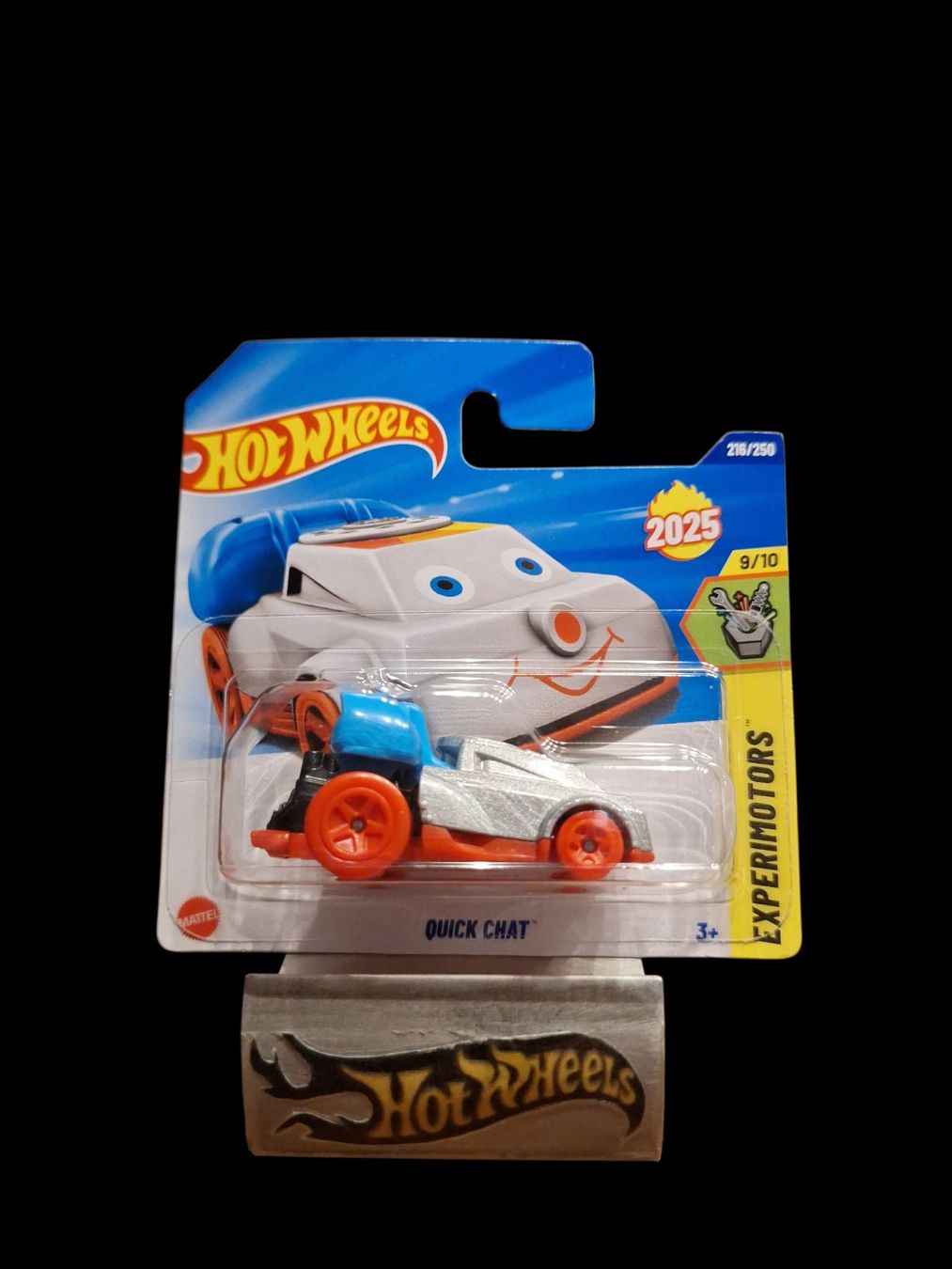 The Hot Wheels 2025 Case L Quick Chat Telephone from the Experimotors Series 9/10 in white color is a diecast toy vehicle in 1:64 scale. This model, featuring a phone design, is